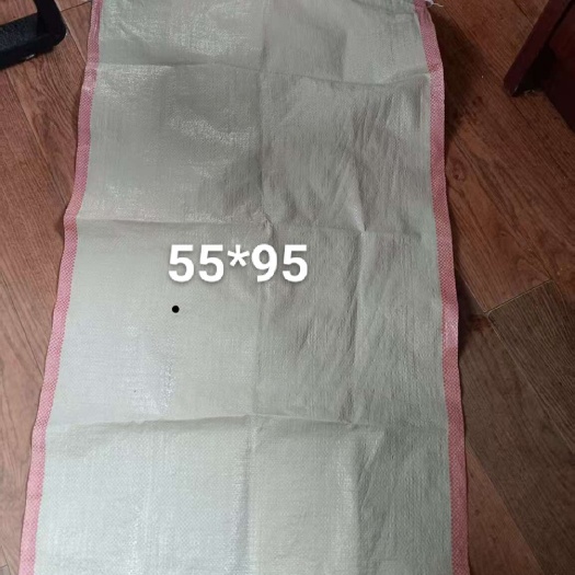 大连55*95瓷白红边编织袋