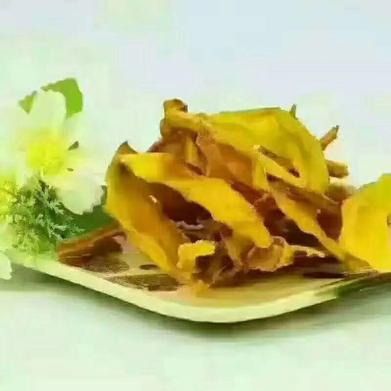  华坪晚熟芒果烤出的香甜可口的芒果干，没有任何添加剂
