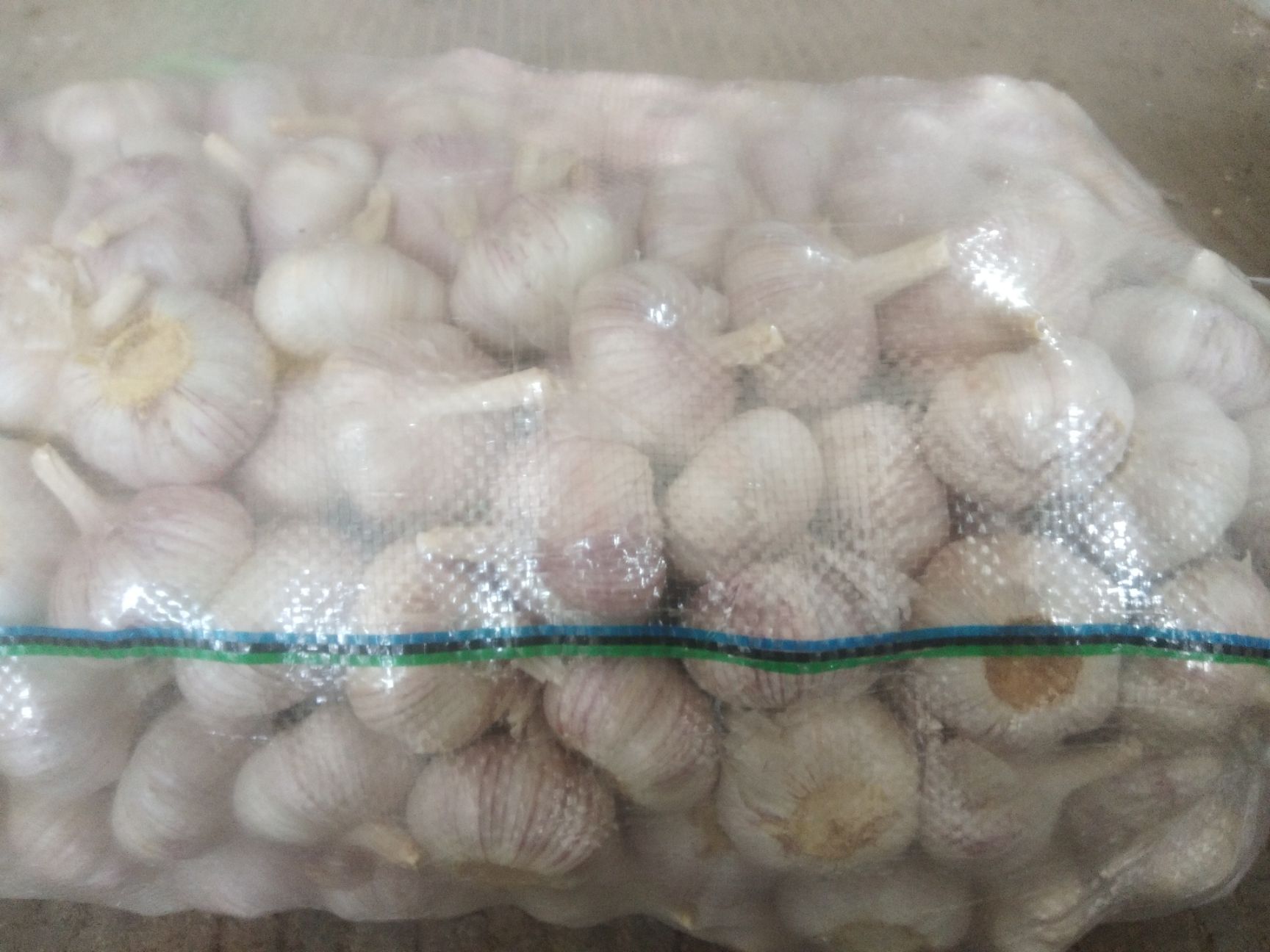  江苏邳州大蒜，5.5－6.5型号。武汉地区量多可保送。