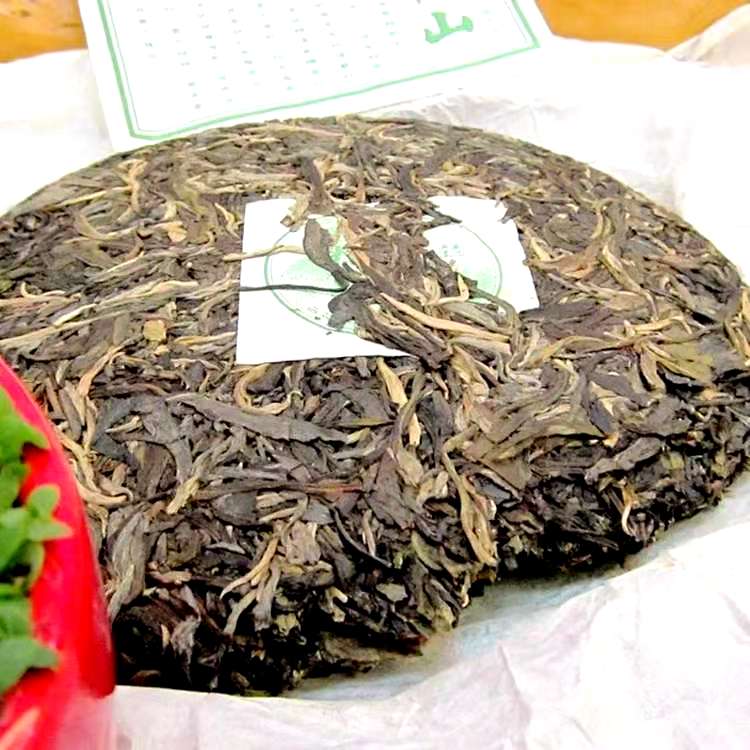 普洱饼茶  2013南糯山普洱茶生茶饼生态古树茶云南勐海七子饼生饼