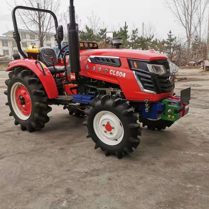 轮式拖拉机  四缸四驱农用拖拉机 东方红动力704水田旱地犁
