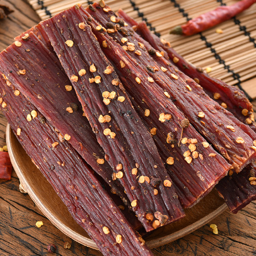 重庆市西藏牛肉干麻辣零食景点特产小吃手撕风干牛肉散装批发猪肉干展会